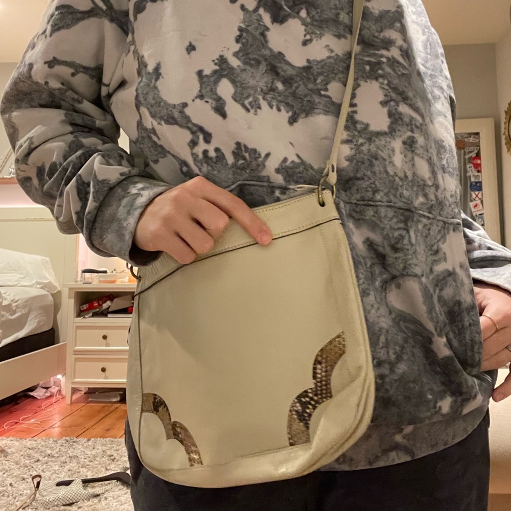 Cute leather bag with snake skin detail..